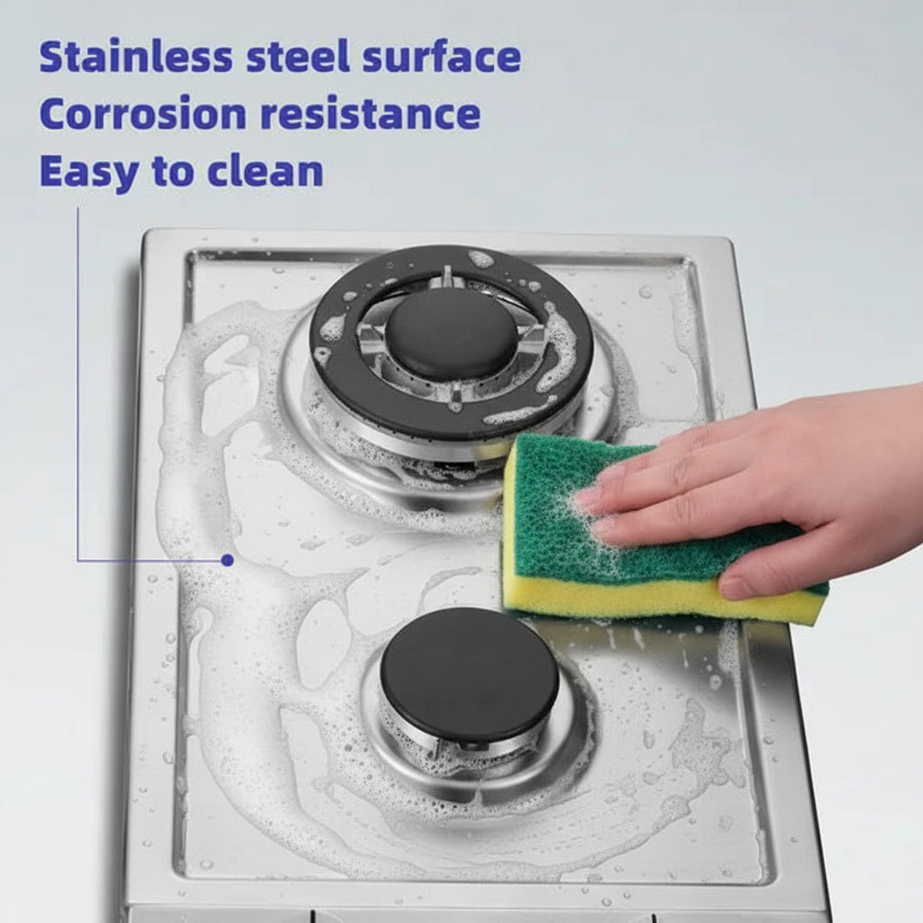 Stainless steel gas stove being cleaned with a cloth on a light gray background