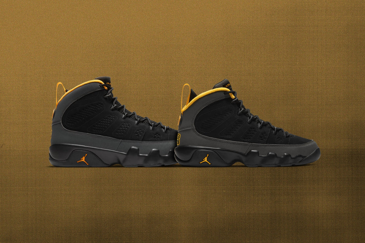 Air Jordan 9 Retro (GS) "University Gold" - Black/Dark Charcoal